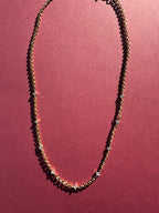 Starlight Chain on maroon background 