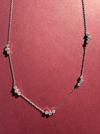 Dainty Trio bezeled necklace (Silver) On maroon colored background