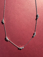 Dainty Trio bezeled necklace (Silver) On maroon colored background